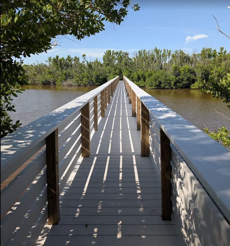 Boardwalk crossing the tidal lagoon toward Bowman's Beach