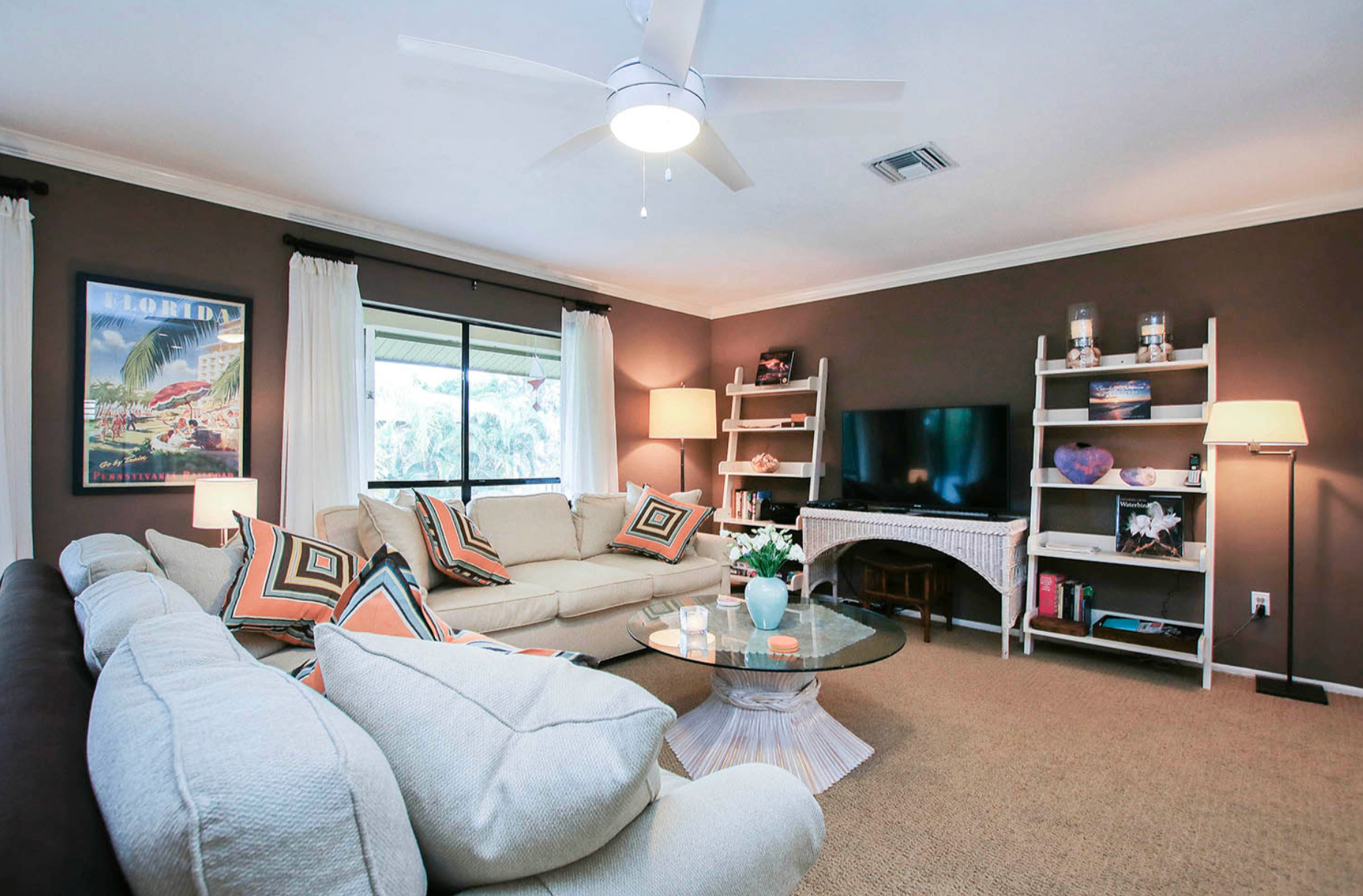 Living room at Blind Pass Beauty with vintage Florida art